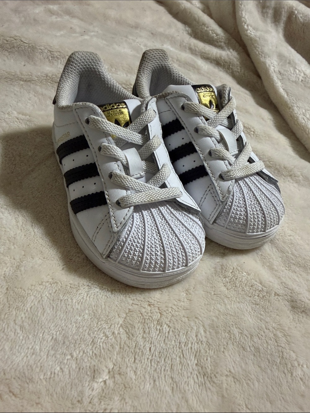 adidas Kids White Sneakers with Black Stripes and Gold Tongue